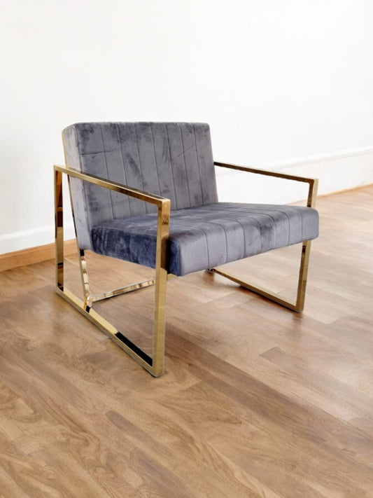 Fauteuil Keny – Tissu Gris et Détails Dorés – Élégance et Confort